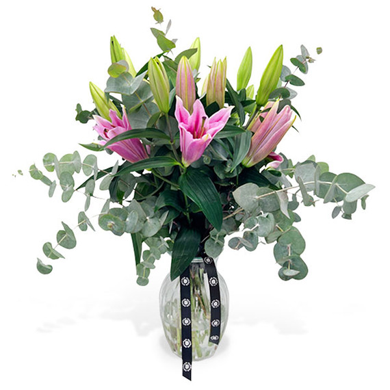 Delightfully fragrant pink Stargazer lilies beautifully combined with eucalyptus cinerea greenery to brighten your home.